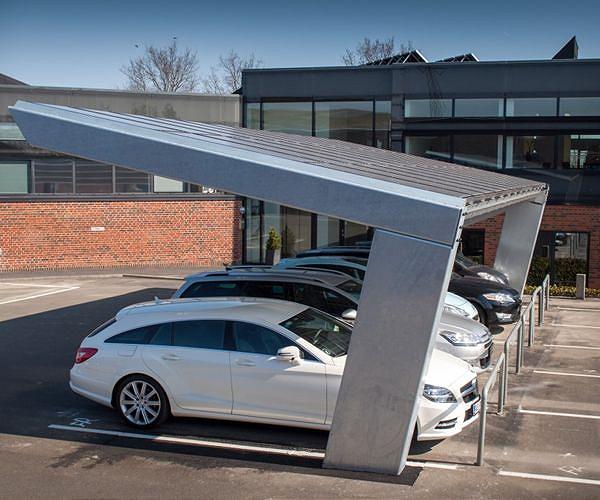 Solar awnings over parking lots help companies and customers